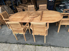 Load image into Gallery viewer, Teak Oval Extending Table 180cm to 240cm and 6 Oxford stacking chairs ( Seconds)