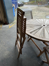 Load image into Gallery viewer, 120cm Sunshine Round Teak Folding Table &amp;4 Hampton chairs Seconds needs sanding
